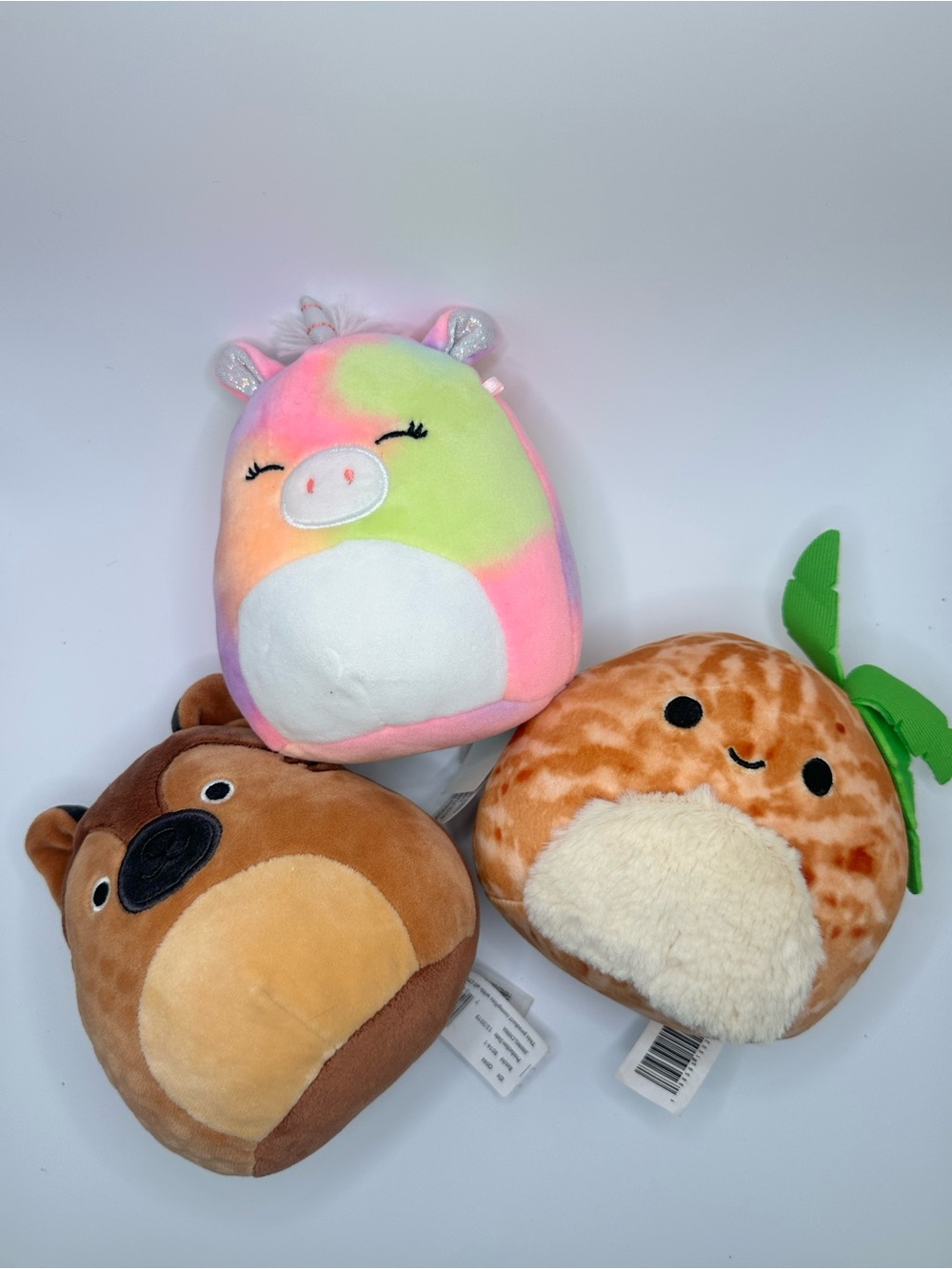 Squishmallows Mini Lot of 3 – Tie-Dye Unicorn, Brown Dog, Coconut